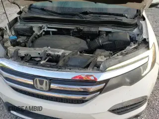 ✅ 2018 Honda Pilot Touring • VIN: 5FNYF6H9XJB011517 • Лот: 80257315. Опубликован ранее на Copart с пробегом 139 020 миль. Бесплатный доступ к архиву аукционных продаж из США и подробный отчёт об истории автомобиля на DreamBid. Изображение 14.