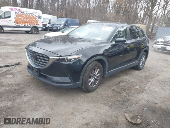 ✅ 2018 Mazda CX-9 Sport • VIN: JM3TCBBY0J0213588 • Lot: 44651524. Wystawiony na IAAI z przebiegiem 146 139 mil. Bezpłatny archiwum sprzedaży aukcyjnych z USA i szczegółowy raport historii pojazdu na DreamBid. Zdjęcie 2.