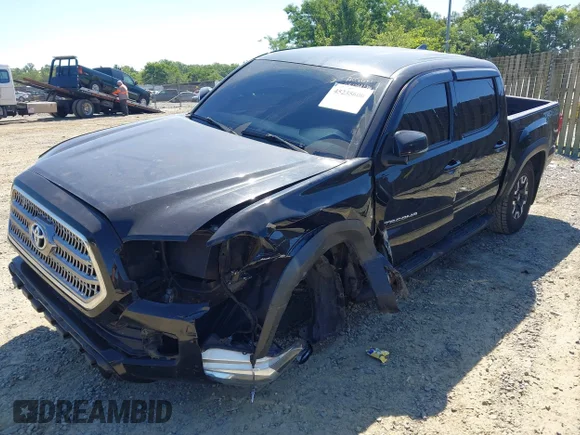 ✅ 2017 Toyota Tacoma TRD Sport • VIN: 3TMCZ5AN0HM061058 • Lot: 45235600. Listed on IAAI with 132,319 mi. Free auction sales archive from the USA and detailed vehicle history report at DreamBid. Image 2.