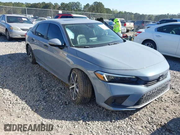 ✅ 2024 Honda Civic Touring • VIN: 2HGFE1F93RH302593 • Лот: 44644206. Опубліковано раніше на IAAI з пробігом 27 162 миль. Безкоштовний доступ до архіву аукціонних продажів зі США та докладний звіт про історію автомобіля на DreamBid. Зображення 1.