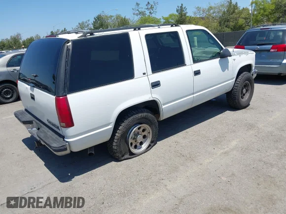 ✅ 1996 Chevrolet Tahoe • VIN: 1GNEK13R9TJ357134 • Lot: 42218520. Wystawiony na IAAI z przebiegiem 213 135 mil. Bezpłatny archiwum sprzedaży aukcyjnych z USA i szczegółowy raport historii pojazdu na DreamBid. Zdjęcie 4.