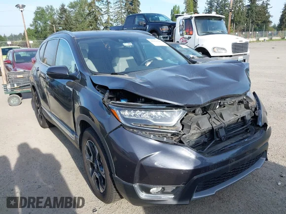 ✅ 2019 Honda CR-V Touring • VIN: 7FARW2H93KE023737 • Lot: 44964246. Listed on IAAI with 50,998 mi. Free auction sales archive from the USA and detailed vehicle history report at DreamBid. Image 1.