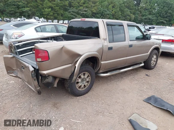 ✅ 2002 GMC Sonoma SLS • VIN: 1GTDT13W12K136157 • Лот: 43075542. Опубліковано раніше на IAAI з пробігом 312 096 миль. Безкоштовний доступ до архіву аукціонних продажів зі США та докладний звіт про історію автомобіля на DreamBid. Зображення 4.