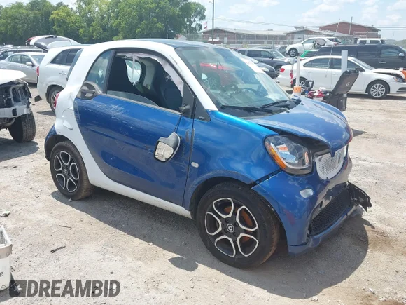 ✅ 2016 Smart fortwo Passion • VIN: WMEFJ5DA8GK078694 • Lot: 42860365. Wystawiony na IAAI z przebiegiem 150 588 mil. Bezpłatny archiwum sprzedaży aukcyjnych z USA i szczegółowy raport historii pojazdu na DreamBid. Zdjęcie 1.
