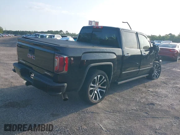 ✅ 2016 GMC Sierra 1500 Denali • VIN: 3GTU2PEC6GG201706 • Лот: 43135127. Опубліковано раніше на IAAI з пробігом Не вказано. Безкоштовний доступ до архіву аукціонних продажів зі США та докладний звіт про історію автомобіля на DreamBid. Зображення 4.