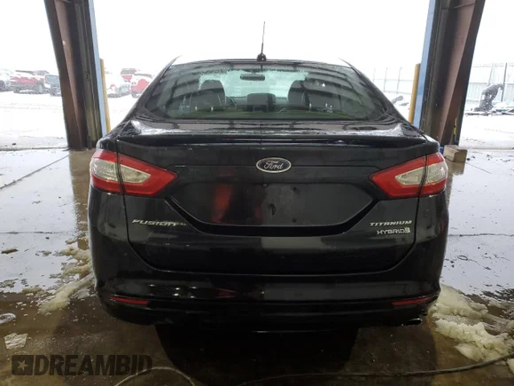 ✅ 2015 Ford Fusion Titanium Hybrid • VIN: 3FA6P0RUXFR178699 • Лот: 43319263. Опубліковано раніше на Copart з пробігом 125 574 миль. Безкоштовний доступ до архіву аукціонних продажів зі США та докладний звіт про історію автомобіля на DreamBid. Зображення 6.