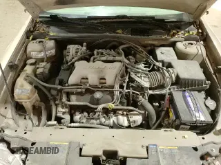 2003 Chevrolet Malibu LS z VIN 1G1NE52J13M708743, wystawiony jako Copart lot #84834634 z przebiegiem 292 197 mil mil oraz Czysty tytuł • Clean title. Historia ofert i sprzedaży dostępna na DreamBid. Obrazek 13.