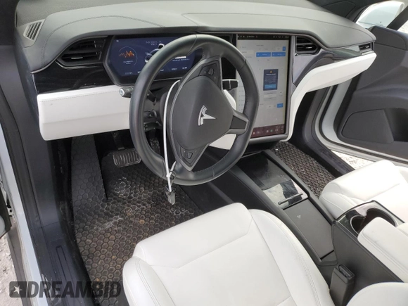 ✅ 2018 Tesla Model X 75D • VIN: 5YJXCDE26JF117463 • Лот: 79485743. Опубликован ранее на Copart с пробегом 56 182 миль. Бесплатный доступ к архиву аукционных продаж из США и подробный отчёт об истории автомобиля на DreamBid. Изображение 8.