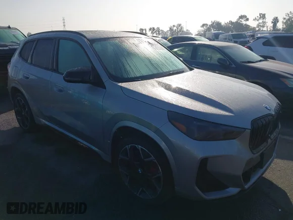 ✅ 2026 BMW X1 M35i • VIN: WBX13EF06T5445322 • Lot: 43987021. Wystawiony na IAAI z przebiegiem 7 453 mil. Bezpłatny archiwum sprzedaży aukcyjnych z USA i szczegółowy raport historii pojazdu na DreamBid. Zdjęcie 1.