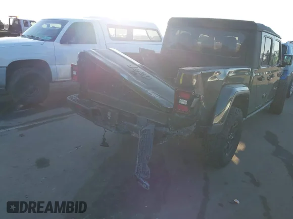 ✅ 2021 Jeep Gladiator Willys Sport • VIN: 1C6HJTAG9ML623609 • Лот: 43994263. Опубліковано раніше на IAAI з пробігом 58 474 миль. Безкоштовний доступ до архіву аукціонних продажів зі США та докладний звіт про історію автомобіля на DreamBid. Зображення 6.