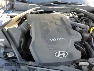 2015 Hyundai Genesis 3.8L z VIN KMHGN4JE9FU095981, wystawiony jako Copart lot #82827534 z przebiegiem 100 865 mil mil oraz Szkoda całkowita • Salvage title. Historia ofert i sprzedaży dostępna na DreamBid. Obrazek 13.