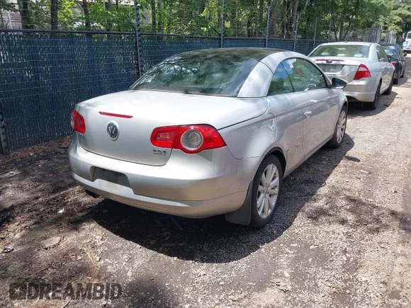 ✅ 2010 Volkswagen Eos Komfort • VIN: WVWBA7AH9AV015748 • Лот: 42786578. Опубликован ранее на IAAI с пробегом 130 099 миль. Бесплатный доступ к архиву аукционных продаж из США и подробный отчёт об истории автомобиля на DreamBid. Изображение 4.