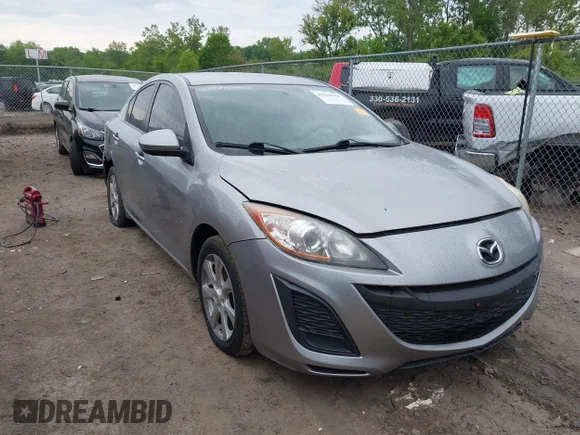 ✅ 2010 Mazda 3 i Touring • VIN: JM1BL1SG4A1346497 • Lot: 42368618. Listed on IAAI with 127,863 mi. Free auction sales archive from the USA and detailed vehicle history report at DreamBid. Image 1.