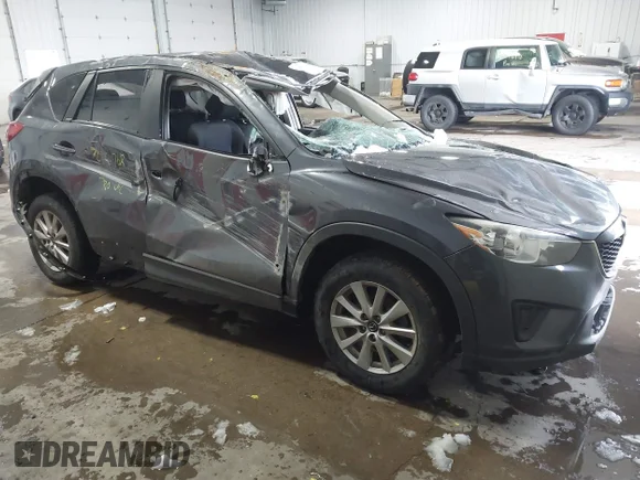 ✅ 2015 Mazda CX-5 Sport • VIN: JM3KE4BY2F0515490 • Lot: 44026768. Wystawiony na IAAI z przebiegiem 92 294 mil. Bezpłatny archiwum sprzedaży aukcyjnych z USA i szczegółowy raport historii pojazdu na DreamBid. Zdjęcie 1.