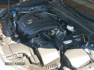 ✅ 2020 Mazda CX-30 Premium • VIN: 3MVDMBEM5LM139909 • Lot: 42432883. Listed on IAAI with 40,107 mi. Free auction sales archive from the USA and detailed vehicle history report at DreamBid. Image 19.