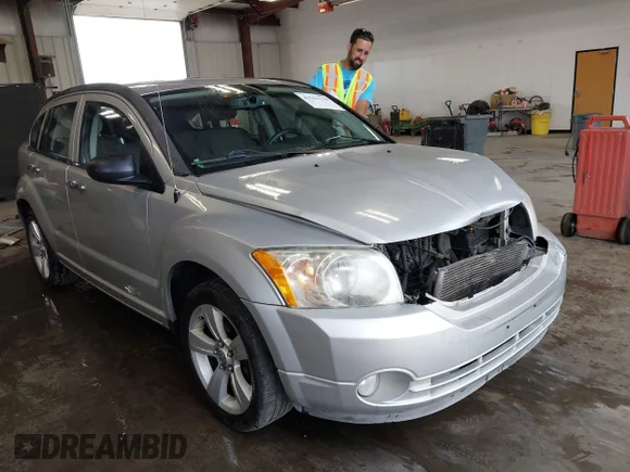 ✅ 2011 Dodge Caliber Mainstreet • VIN: 1B3CB3HA6BD242276 • Lot: 42561118. Listed on IAAI with 154,829 mi. Free auction sales archive from the USA and detailed vehicle history report at DreamBid. Image 1.