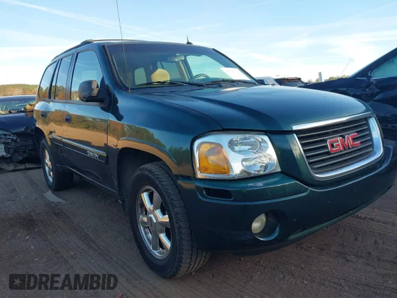 ✅ 2005 GMC Envoy SLT • VIN: 1GKDS13S452164592 • Lot: 43750733. Listed on IAAI with 201,919 mi. Free auction sales archive from the USA and detailed vehicle history report at DreamBid. Image 1.