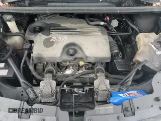 ✅ 2009 Pontiac Montana • VIN: 1GMDU23169D106055 • Лот: 86498584. Опубликован ранее на Copart с пробегом 289 060 миль. Бесплатный доступ к архиву аукционных продаж из США и подробный отчёт об истории автомобиля на DreamBid. Изображение 14.