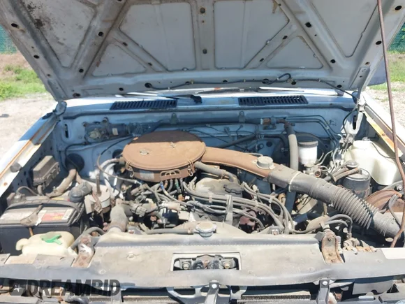 ✅ 1987 Nissan Hardbody • VIN: 1N6ND11SXHC328971 • Lot: 42667554. Wystawiony na IAAI z przebiegiem 236 872 mil. Bezpłatny archiwum sprzedaży aukcyjnych z USA i szczegółowy raport historii pojazdu na DreamBid. Zdjęcie 10.