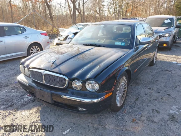 ✅ 2005 Jaguar XJ Vanden Plas • VIN: SAJWA82C85SG43869 • Lot: 43985849. Wystawiony na IAAI z przebiegiem 156 009 mil. Bezpłatny archiwum sprzedaży aukcyjnych z USA i szczegółowy raport historii pojazdu na DreamBid. Zdjęcie 6.