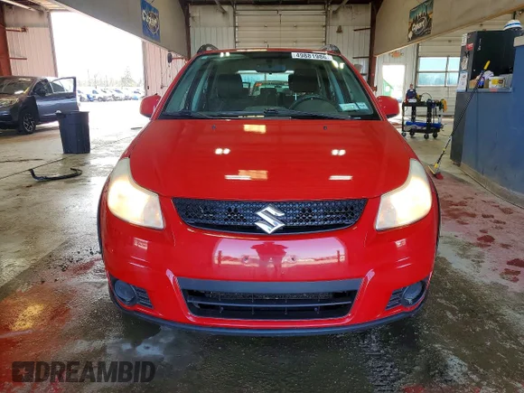 ✅ 2010 Suzuki SX4 • VIN: JS2YB5A36A6300097 • Lot: 49881986. Wystawiony na Copart z przebiegiem 134 341 mil. Bezpłatny archiwum sprzedaży aukcyjnych z USA i szczegółowy raport historii pojazdu na DreamBid. Zdjęcie 5.