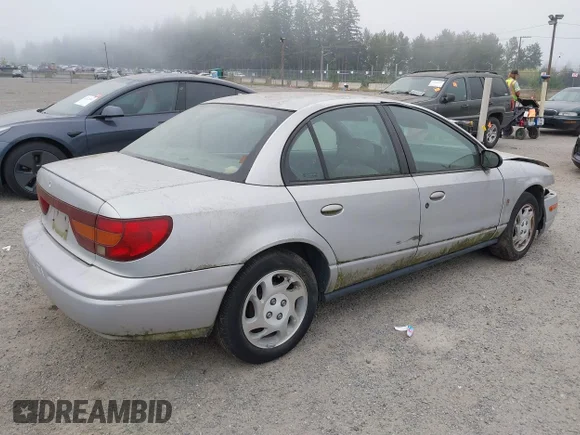 ✅ 2001 Saturn SL • VIN: 1G8ZJ52781Z257247 • Лот: 43150809. Опубліковано раніше на IAAI з пробігом 216 098 миль. Безкоштовний доступ до архіву аукціонних продажів зі США та докладний звіт про історію автомобіля на DreamBid. Зображення 4.