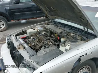 ✅ 1996 Buick Park Avenue • VIN: 1G4CW52K5TH604037 • Lot: 42869866. Wystawiony na IAAI z przebiegiem 160 449 mil. Bezpłatny archiwum sprzedaży aukcyjnych z USA i szczegółowy raport historii pojazdu na DreamBid. Zdjęcie 13.