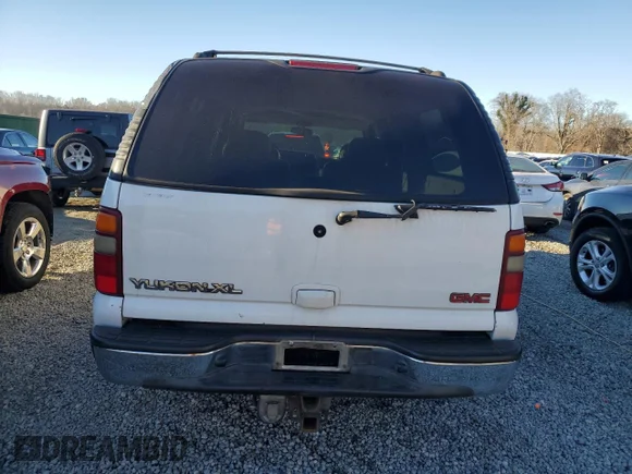 ✅ 2002 GMC Yukon XL SLT • VIN: 3GKFK16Z52G309319 • Lot: 88467795. Wystawiony na Copart z przebiegiem 450 230 mil. Bezpłatny archiwum sprzedaży aukcyjnych z USA i szczegółowy raport historii pojazdu na DreamBid. Zdjęcie 6.