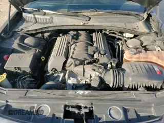 ✅ 2013 Chrysler 300 SRT-8 • VIN: 2C3CCAFJ8DH646483 • Лот: 83261144. Опубликован ранее на Copart с пробегом 86 015 миль. Бесплатный доступ к архиву аукционных продаж из США и подробный отчёт об истории автомобиля на DreamBid. Изображение 14.