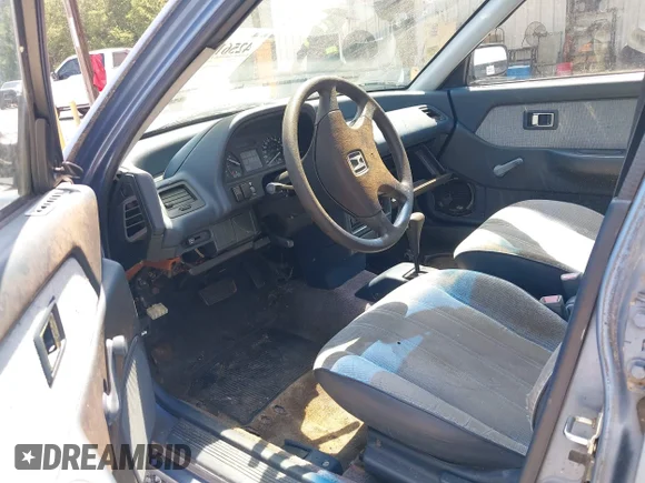 ✅ 1991 Honda Civic DX • VIN: 1HGED3643ML072631 • Lot: 42561254. Wystawiony na IAAI z przebiegiem 239 711 mil. Bezpłatny archiwum sprzedaży aukcyjnych z USA i szczegółowy raport historii pojazdu na DreamBid. Zdjęcie 5.