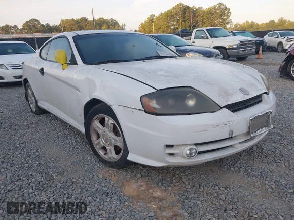 ✅ 2003 Hyundai Tiburon GT • VIN: KMHHN65F63U061107 • Lot: 43266517. Listed on IAAI with Not provided. Free auction sales archive from the USA and detailed vehicle history report at DreamBid. Image 1.