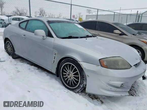 ✅ 2006 Hyundai Tiburon GT • VIN: KMHHN65FX6U199043 • Lot: 44300759. Listed on IAAI with 171,340 mi. Free auction sales archive from the USA and detailed vehicle history report at DreamBid. Image 1.