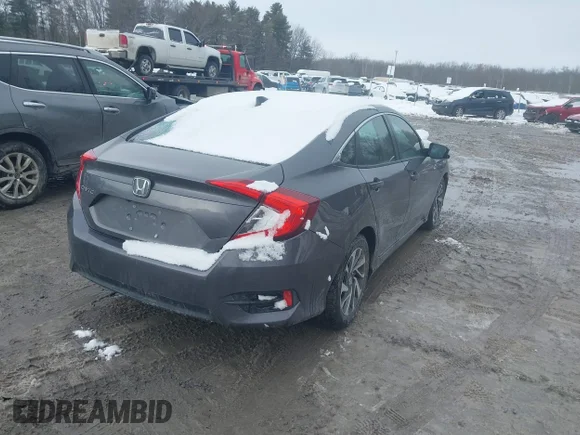 ✅ 2018 Honda Civic EX • VIN: 2HGFC2F76JH597137 • Лот: 44452453. Опубліковано раніше на IAAI з пробігом 61 178 миль. Безкоштовний доступ до архіву аукціонних продажів зі США та докладний звіт про історію автомобіля на DreamBid. Зображення 4.