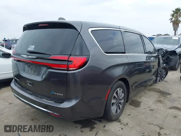 ✅ 2022 Chrysler Pacifica Hybrid Touring L • VIN: 2C4RC1L70NR122691 • Лот: 41465450. Опубліковано раніше на IAAI з пробігом 65 652 миль. Безкоштовний доступ до архіву аукціонних продажів зі США та докладний звіт про історію автомобіля на DreamBid. Зображення 4.