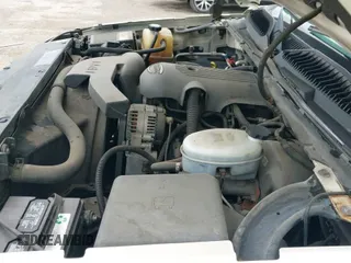 ✅ 2003 Cadillac Escalade • VIN: 1GYEC63T43R215381 • Лот: 42133080. Опубликован ранее на IAAI с пробегом 218 909 миль. Бесплатный доступ к архиву аукционных продаж из США и подробный отчёт об истории автомобиля на DreamBid. Изображение 12.