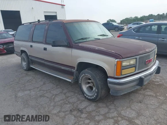 ✅ 1993 GMC Suburban • VIN: 1GKEC16KXPJ734150 • Лот: 42114021. Опубліковано раніше на IAAI з пробігом 254 501 миль. Безкоштовний доступ до архіву аукціонних продажів зі США та докладний звіт про історію автомобіля на DreamBid. Зображення 1.