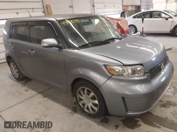 ✅ 2009 Scion xB • VIN: JTLKE50E391061678 • Lot: 43592790. Listed on IAAI with 102,300 mi. Free auction sales archive from the USA and detailed vehicle history report at DreamBid. Image 1.