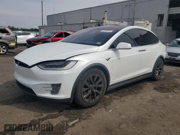 ✅ 2018 Tesla Model X 75D • VIN: 5YJXCBE26JF120321 • Лот: 60106175. Опубліковано раніше на Copart з пробігом 55 859 миль. Безкоштовний доступ до архіву аукціонних продажів зі США та докладний звіт про історію автомобіля на DreamBid. Зображення 1.