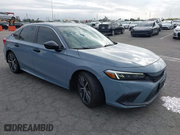 ✅ 2022 Honda Civic Touring • VIN: 2HGFE1F97NH306737 • Lot: 45113852. Listed on IAAI with 78,606 mi. Free auction sales archive from the USA and detailed vehicle history report at DreamBid. Image 1.