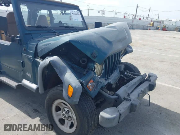 ✅ 1998 Jeep Wrangler SE • VIN: 1J4FY29P9WP777429 • Лот: 45318290. Опубликован ранее на IAAI с пробегом 129 335 миль. Бесплатный доступ к архиву аукционных продаж из США и подробный отчёт об истории автомобиля на DreamBid. Изображение 13.