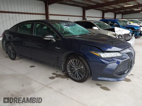 ✅ 2021 Toyota Avalon Hybrid XSE • VIN: 4T1EA1AB4MU002675 • Lot: 43434385. Listed on IAAI with 261,055 mi. Free auction sales archive from the USA and detailed vehicle history report at DreamBid. Image 1.