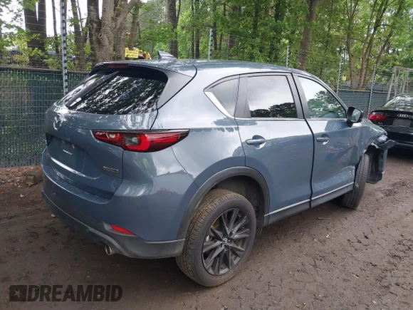 ✅ 2025 Mazda CX-5 S Carbon Edition • VIN: JM3KFBCM1S0681801 • Lot: 45107478. Listed on IAAI with 25,409 mi. Free auction sales archive from the USA and detailed vehicle history report at DreamBid. Image 4.