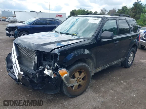 ✅ 2010 Ford Escape XLT • VIN: 1FMCU0D79AKC61489 • Lot: 45005966. Listed on IAAI with 151,673 mi. Free auction sales archive from the USA and detailed vehicle history report at DreamBid. Image 2.