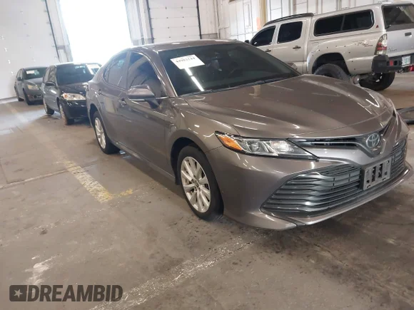 ✅ 2020 Toyota Camry LE • VIN: 4T1L11BK1LU010933 • Lot: 44983144. Listed on IAAI with 76,886 mi. Free auction sales archive from the USA and detailed vehicle history report at DreamBid. Image 1.
