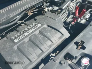 ✅ 2005 Honda Pilot EX-L • VIN: 5FNYF185X5B039890 • Лот: 43036068. Опубликован ранее на IAAI с пробегом 186 419 миль. Бесплатный доступ к архиву аукционных продаж из США и подробный отчёт об истории автомобиля на DreamBid. Изображение 12.