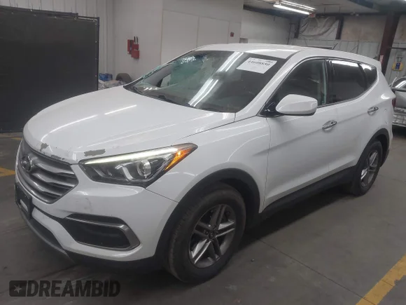 ✅ 2018 Hyundai Santa Fe 2.4L • VIN: 5NMZTDLB0JH080761 • Lot: 44608850. Wystawiony na IAAI z przebiegiem 163 496 mil. Bezpłatny archiwum sprzedaży aukcyjnych z USA i szczegółowy raport historii pojazdu na DreamBid. Zdjęcie 2.
