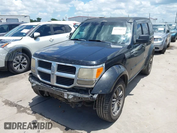 ✅ 2007 Dodge Nitro SXT • VIN: 1D8GT28K17W740723 • Lot: 42590473. Listed on IAAI with 264,488 mi. Free auction sales archive from the USA and detailed vehicle history report at DreamBid. Image 2.