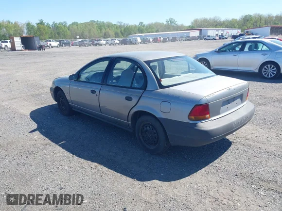 ✅ 1996 Saturn SL • VIN: 1G8ZH5285TZ278029 • Lot: 42132104. Listed on IAAI with 106,737 mi. Free auction sales archive from the USA and detailed vehicle history report at DreamBid. Image 3.