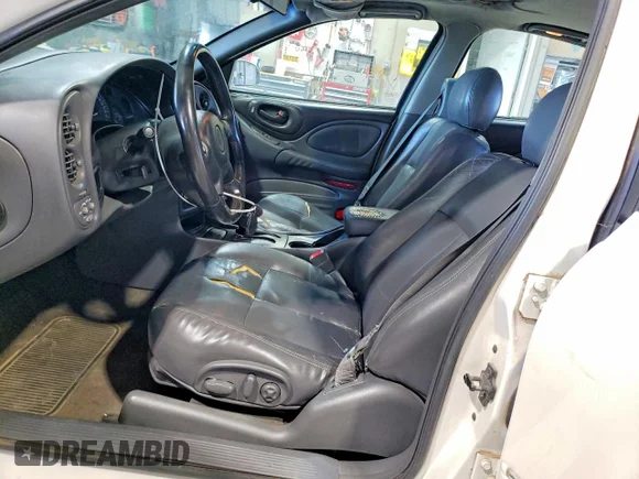 ✅ 2003 Pontiac Bonneville SE • VIN: 1G2HX52K734199592 • Lot: 72577565. Wystawiony na Copart z przebiegiem 252 726 mil. Bezpłatny archiwum sprzedaży aukcyjnych z USA i szczegółowy raport historii pojazdu na DreamBid. Zdjęcie 7.