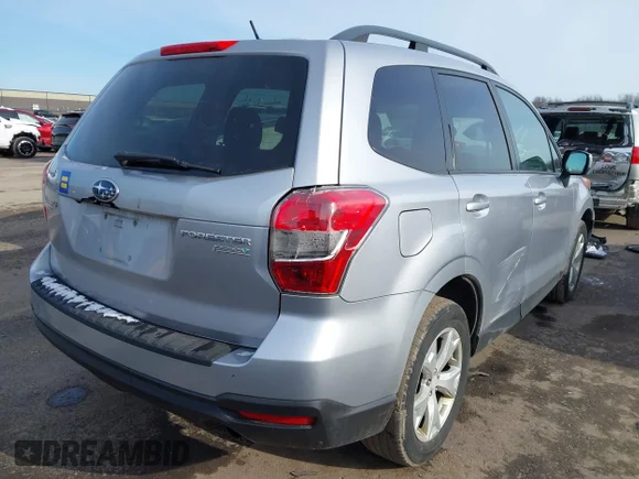 ✅ 2015 Subaru Forester Premium • VIN: JF2SJADC0F8827606 • Лот: 44107763. Опубліковано раніше на IAAI з пробігом 215 810 миль. Безкоштовний доступ до архіву аукціонних продажів зі США та докладний звіт про історію автомобіля на DreamBid. Зображення 4.